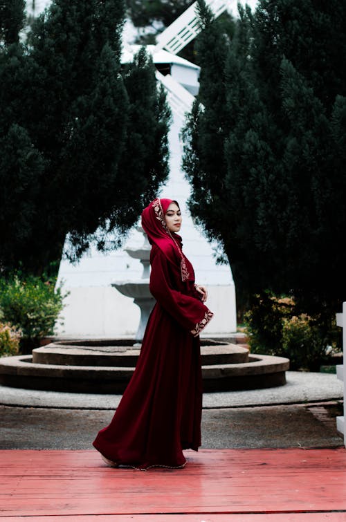 Woman in Traditional Dress Outdoors