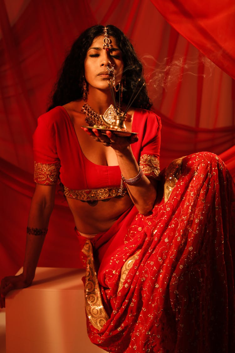 Woman In Red Traditional Clothing