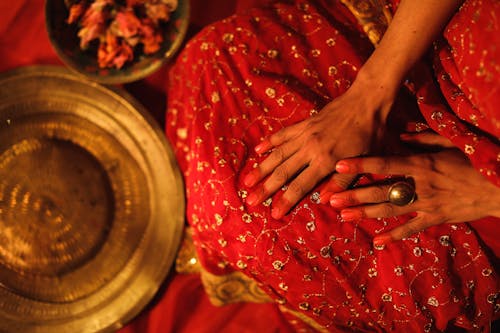 Hands on Red Sari