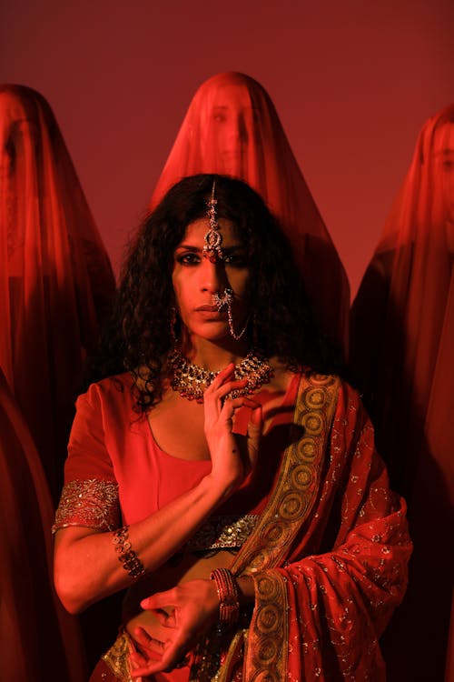 A Beautiful Woman Wearing a Red Sari