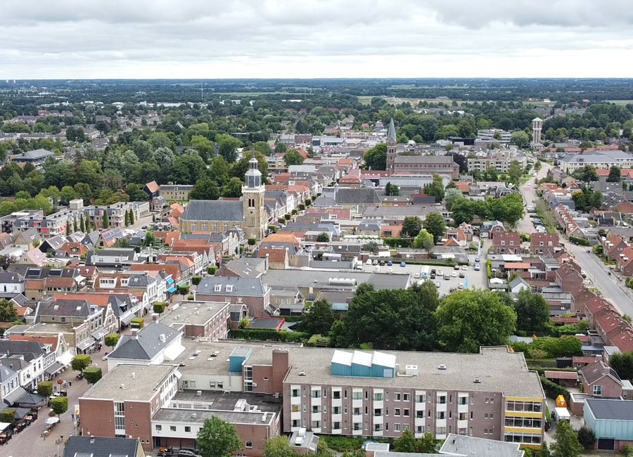 Explore the charming aerial landscape of Joure, featuring historic Dutch architecture.