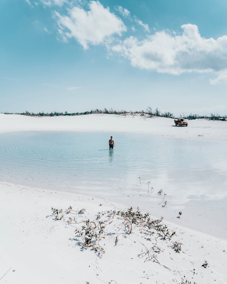 A Man Standing In Water