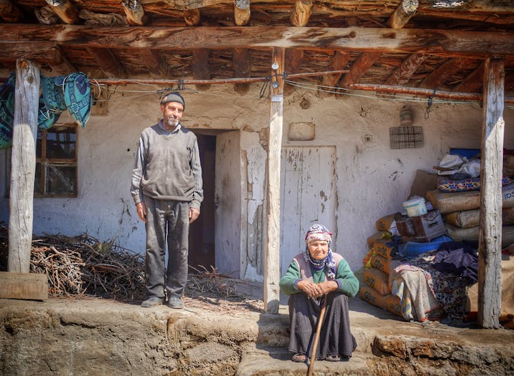 People In Front Of A House