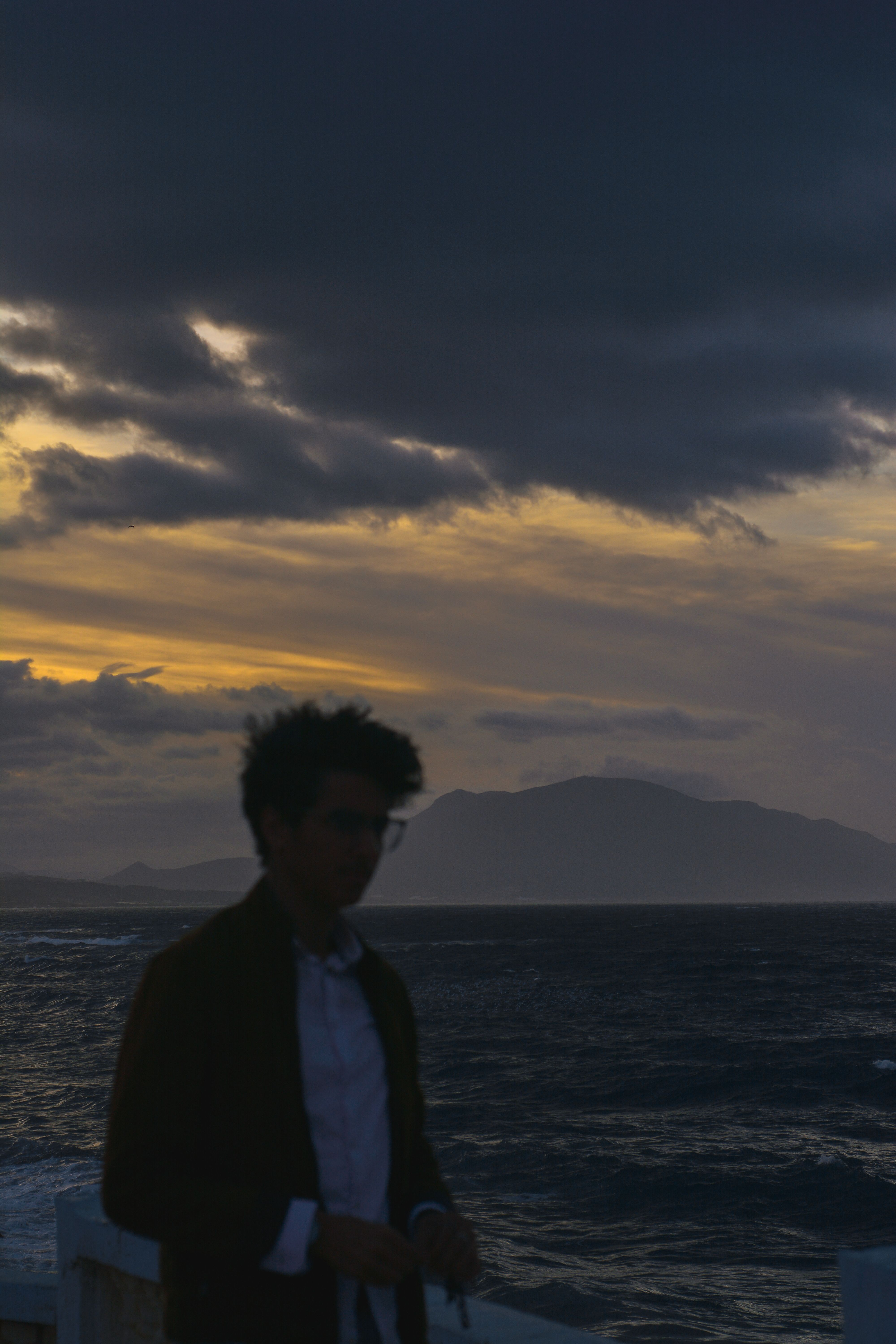Silhouette of a Man Near the Sea · Free Stock Photo