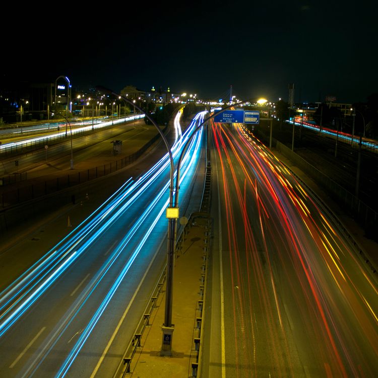 A View of a Highway at Night · Free Stock Photo