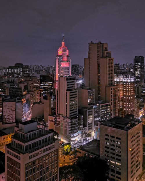 Free Stunning aerial view of São Paulo's illuminated skyscrapers at night, showcasing urban architecture. Stock Photo