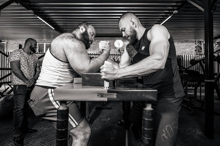 Strong Men Doing An Arm Wrestling Match