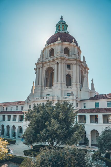 The iconic Pasadena City Hall captured in daylight with a vibrant clear sky, showcasing its unique architectural design.