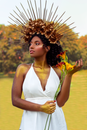 Woman in White Halter Top Holding Sunflower