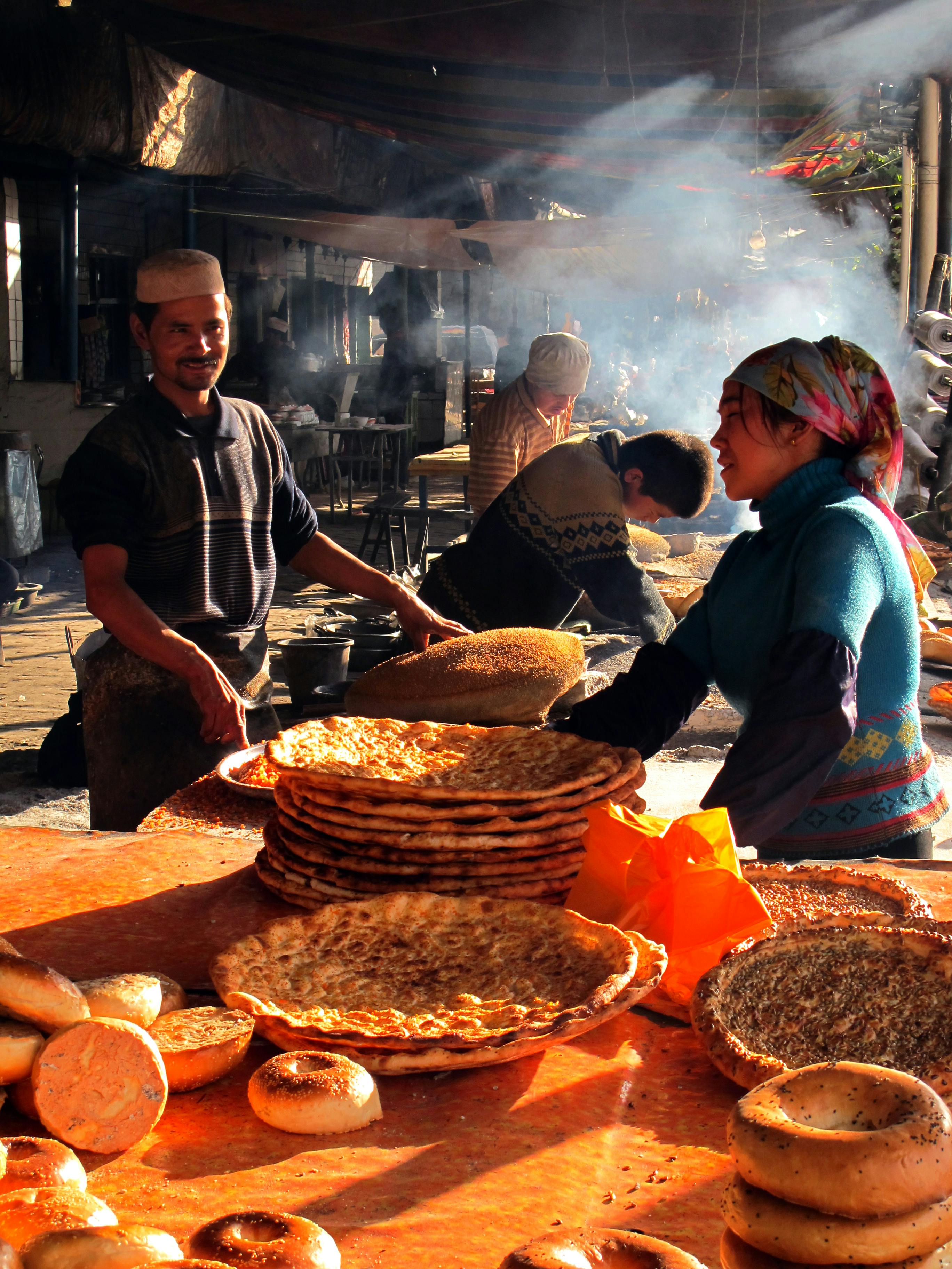 People Standing at the Table
