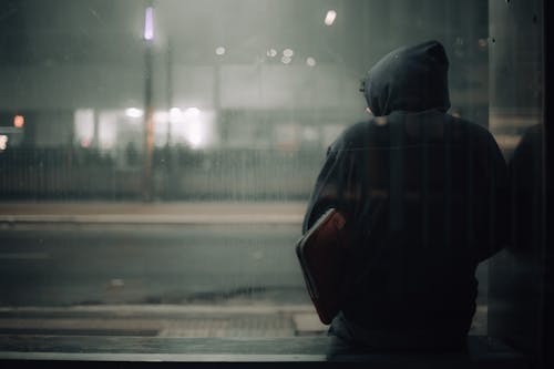 Free A Person Wearing a Black Hoodie Stock Photo
