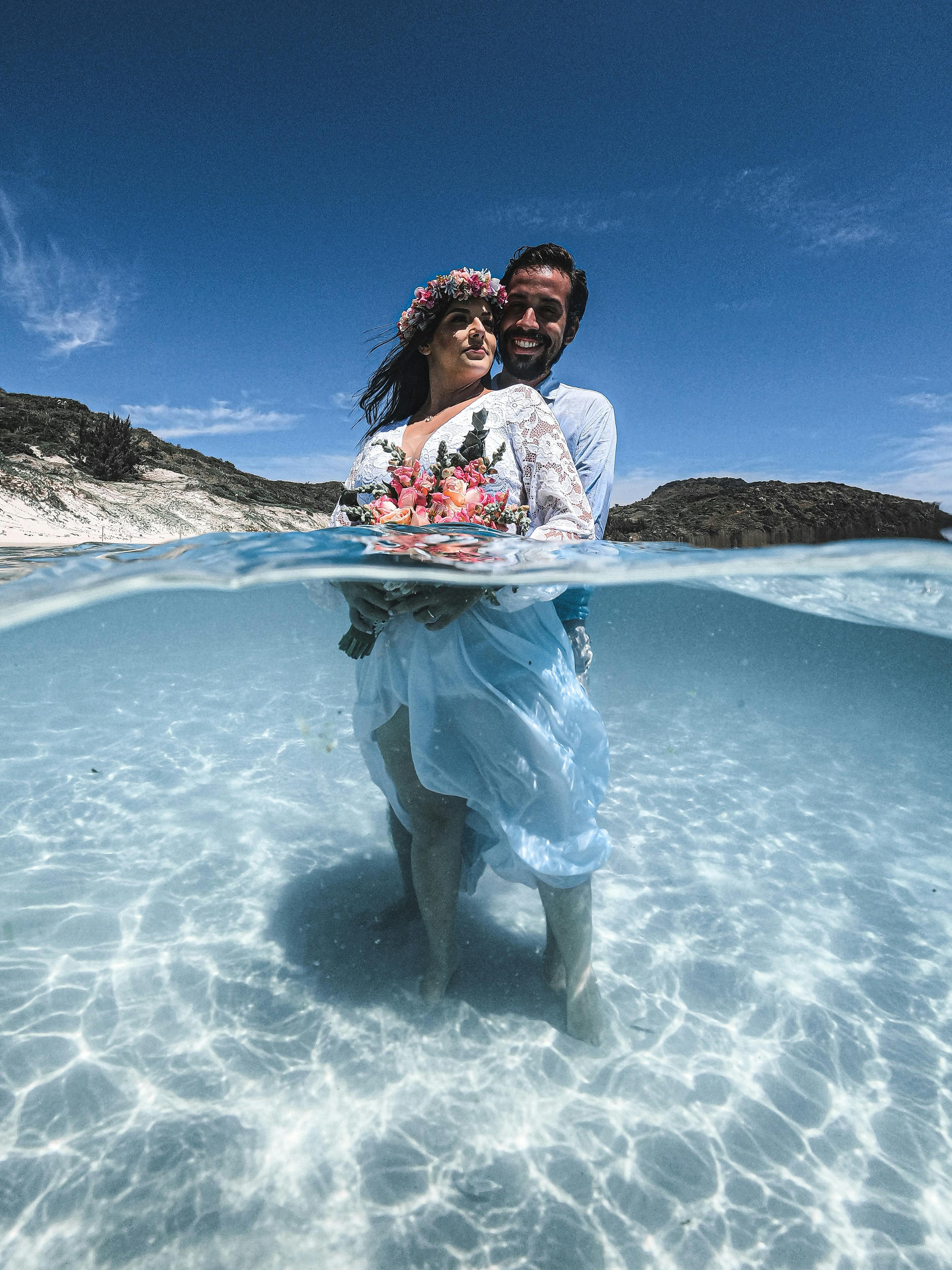 A Couple Embracing Each Other while on Water · Free Stock Photo