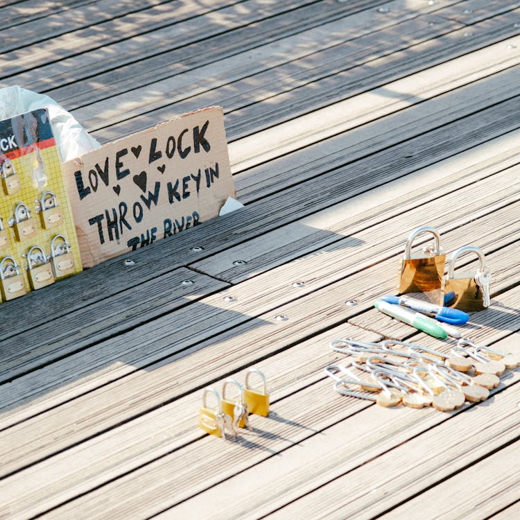 Love Padlocks On Wooden Floor