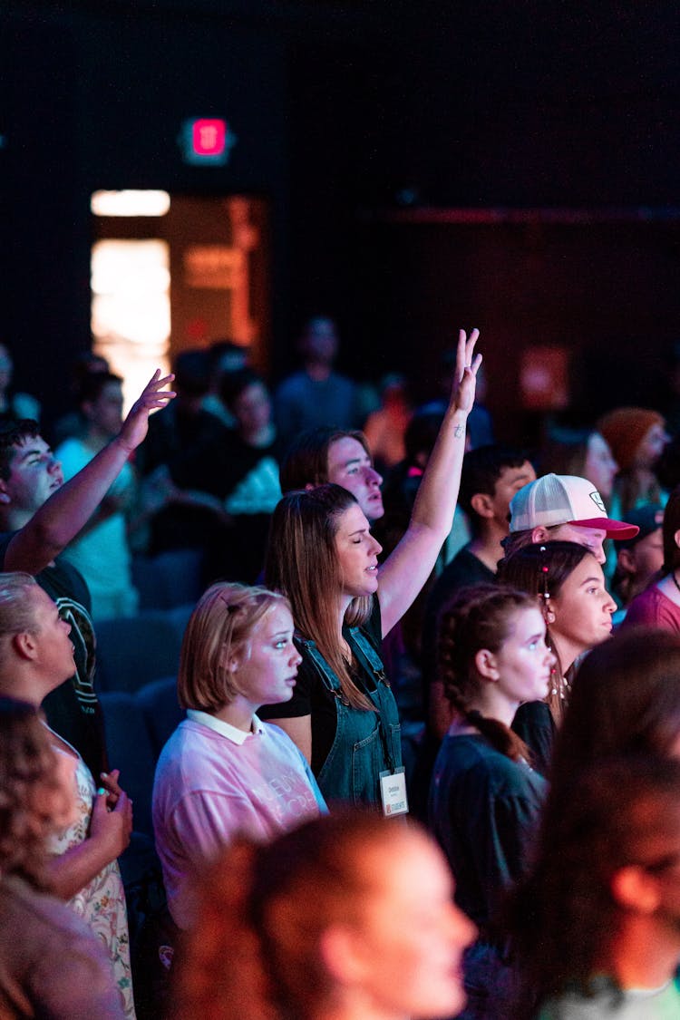 People Worshiping At The Church