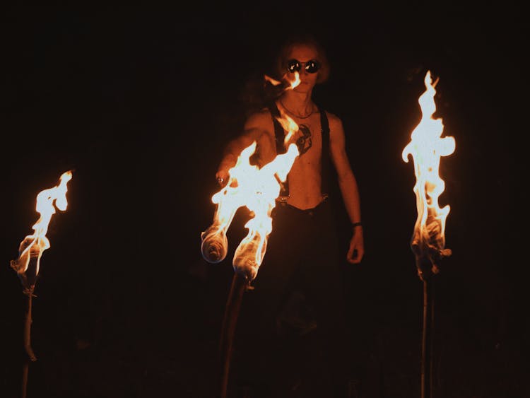 A Man Juggling With Fire