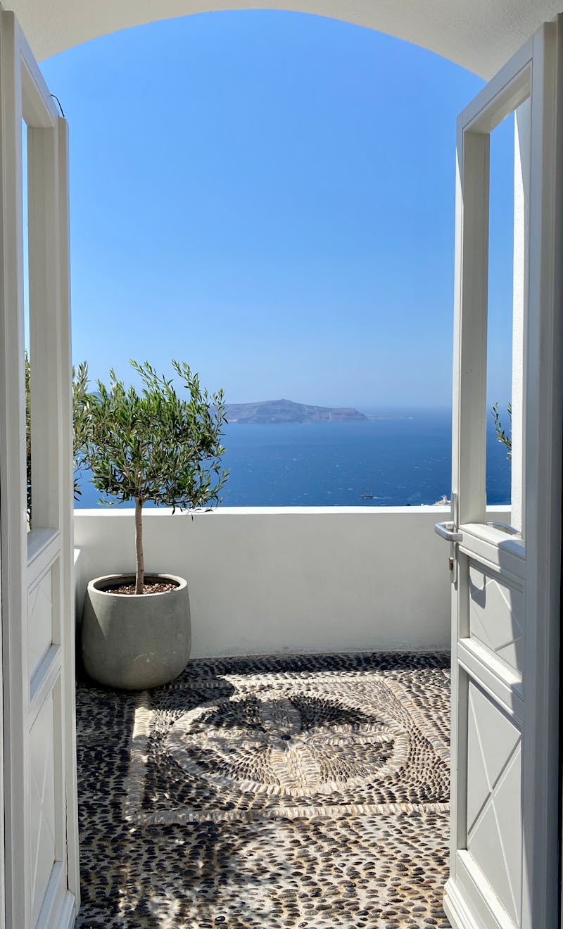 Balcony with ocean view showing glass railing and outdoor space