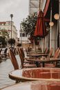An Empty Chairs and Tables on the Street