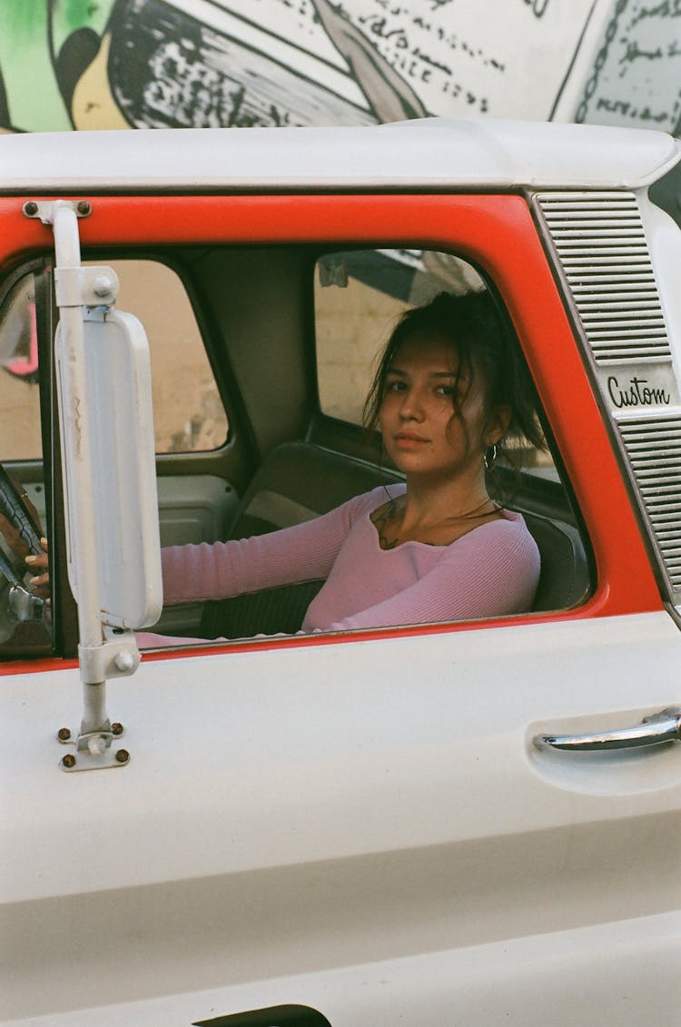 Woman Driving A Pickup Truck