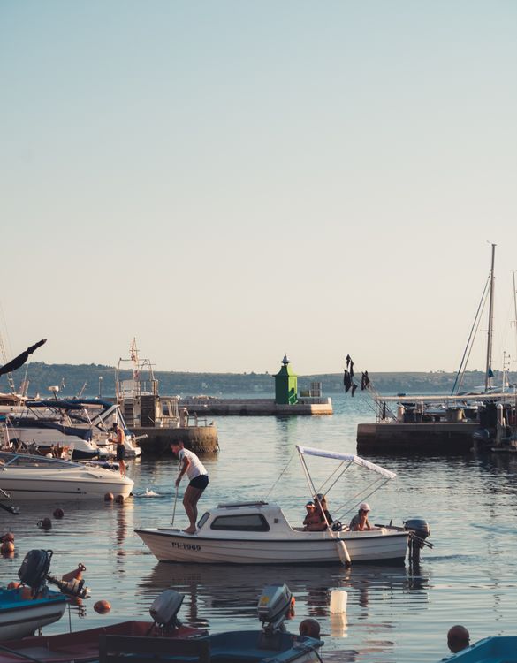 People Riding on White Motor Boat while Sailing on the Sea · Free Stock ...