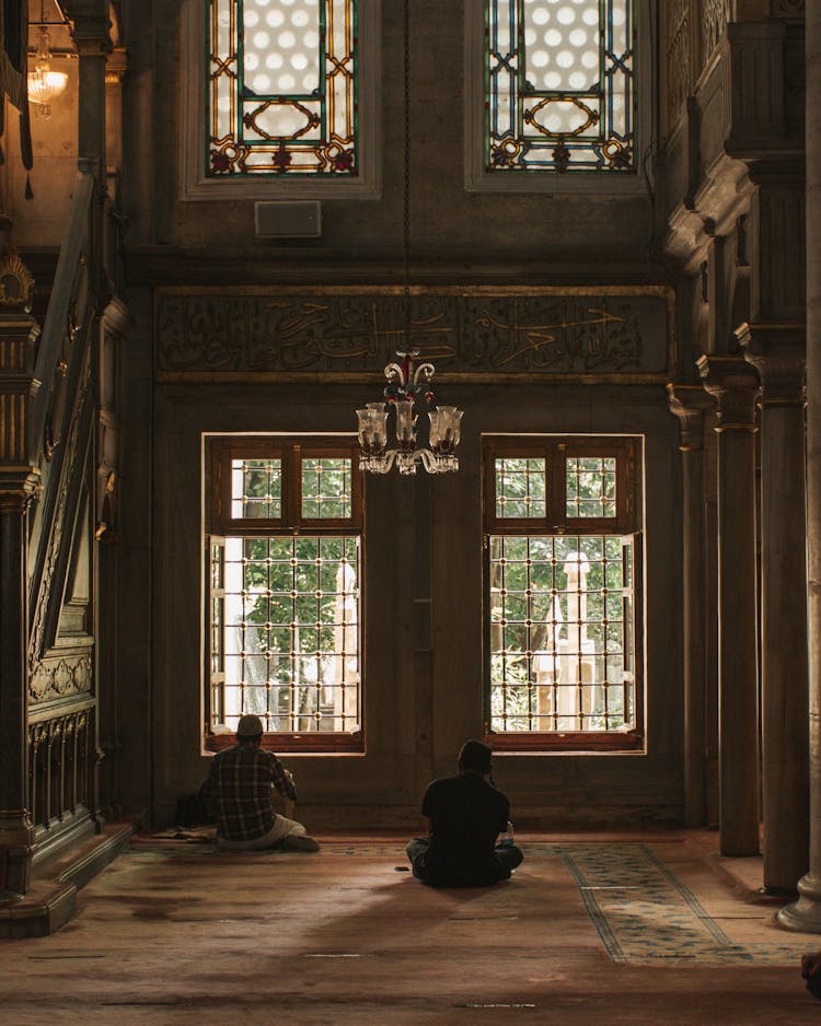 Men Praying On Floor In Old Mosque