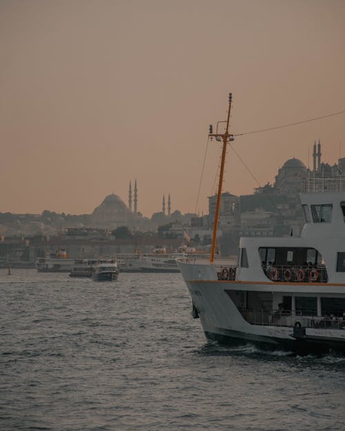 Ferry Boat on the Bosphorus Strait in Istanbul, Turkey during Sunset