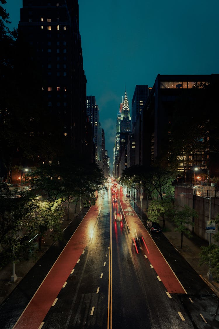 Moving Cars On The Road During Night Time