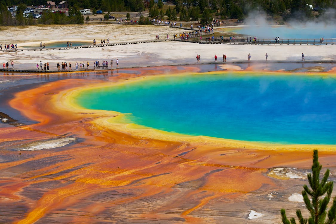 People at the Grand Prismatic Spring in Wyoming, United States