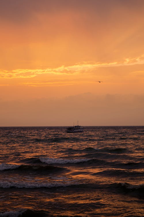 Clouds over Vessel on Open Water