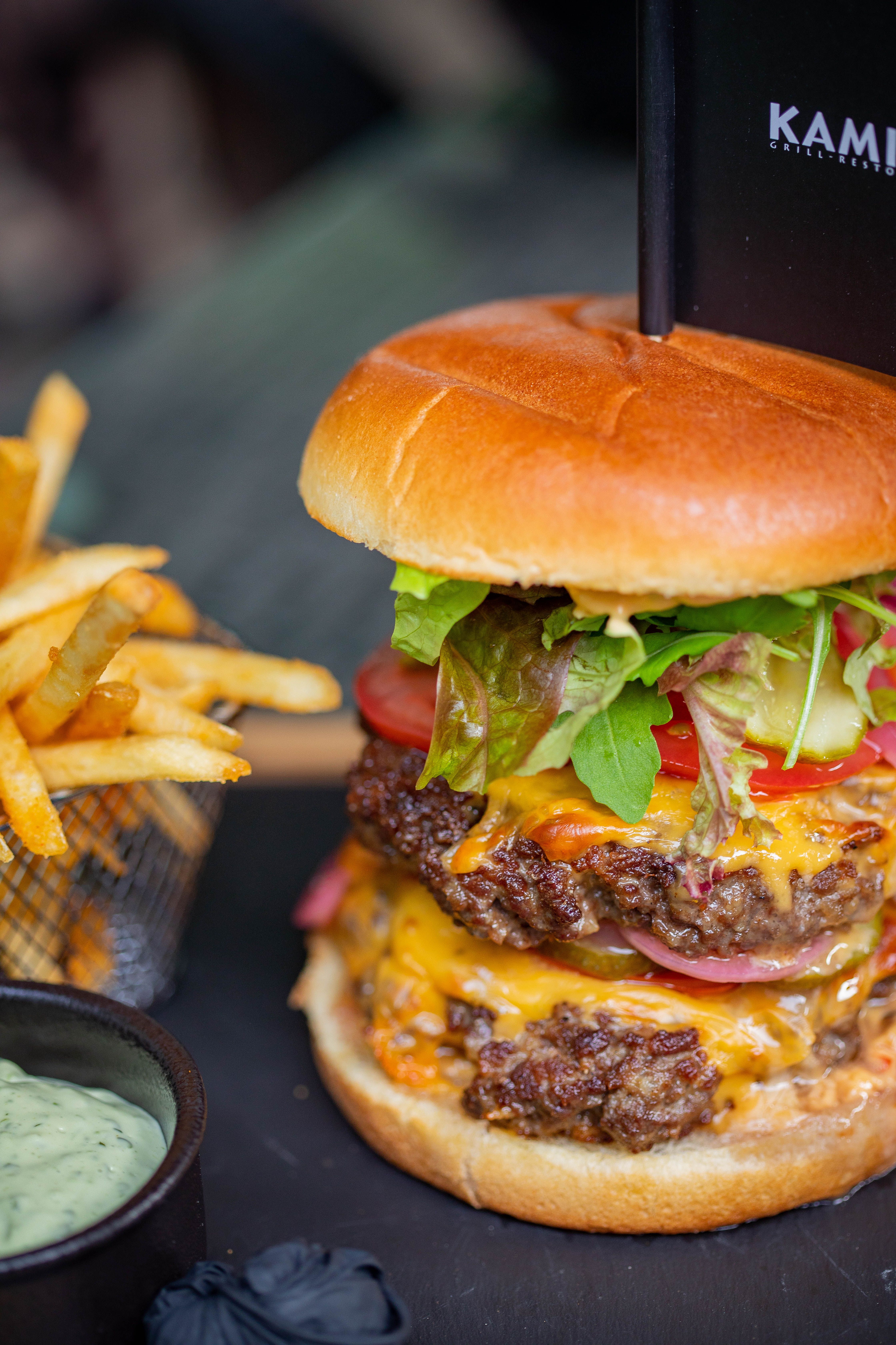 Pure beef burger 180grs, Tchekchouka tomatoes, pickles, cheddar, Russian sauce, tomatoes, straciatella fondante