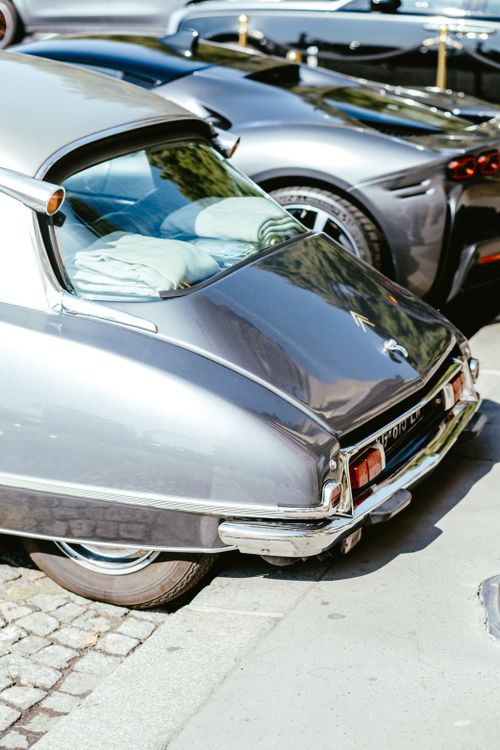 Free Vintage Citroen car with shiny exterior parked on urban pavement in sunlight. Stock Photo