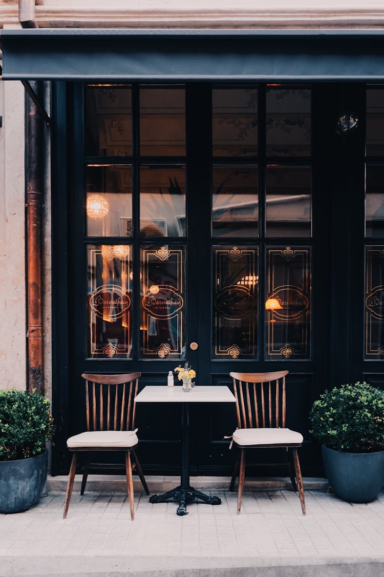 Chairs And A Table Outside The Restaurant