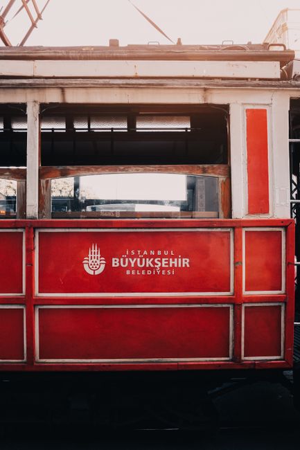 Capture of a historic red tram in Istanbul, highlighting classic transport charm.