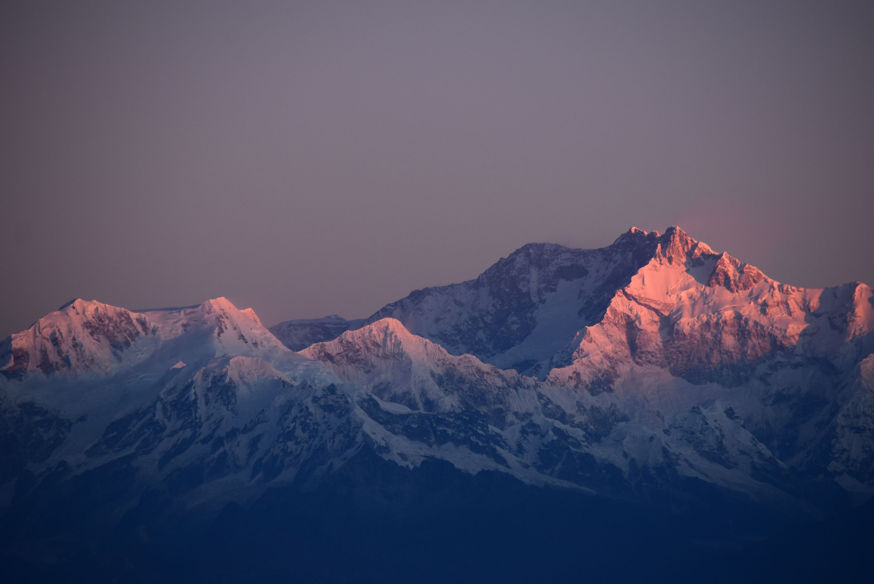 A snowbound ridge line catching the last light