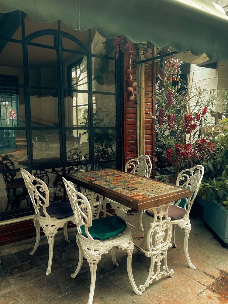 Table And Chairs Near Window