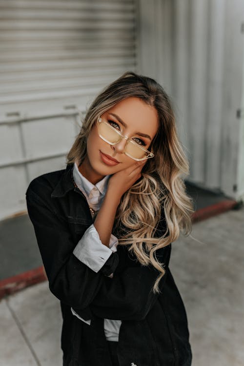 Woman in Black Blazer Wearing Brown Framed Eyeglasses