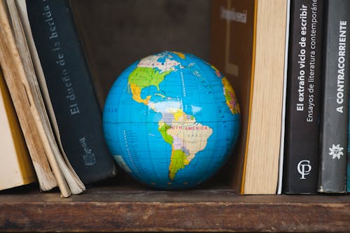 A Globe in Between Books