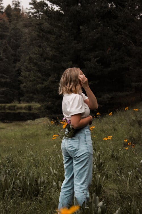 Woman With Flowers on Her Pocket 