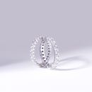 Silver Diamond Studded Rings on White Surface