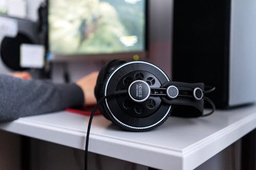 Black Corded Headset on White Table