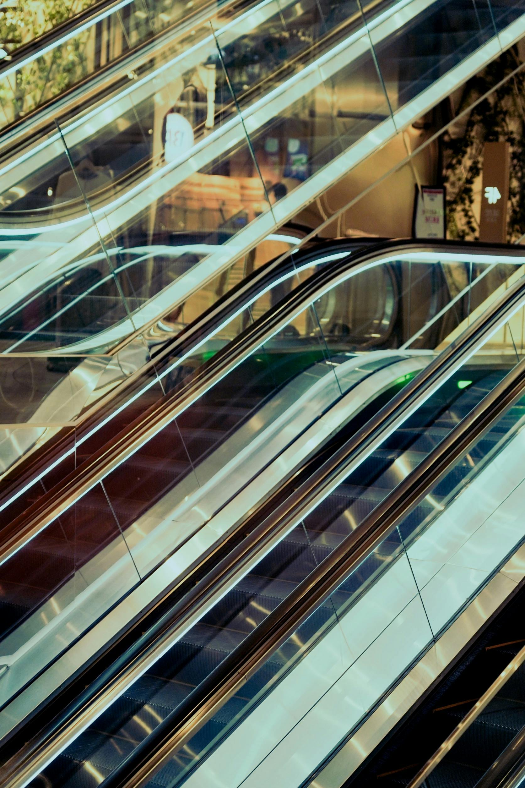Escalators with Glass Panel Handrails · Free Stock Photo