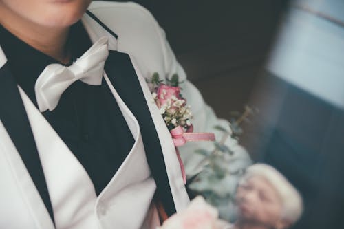 Free Man in White Suit and Bow Tie Stock Photo