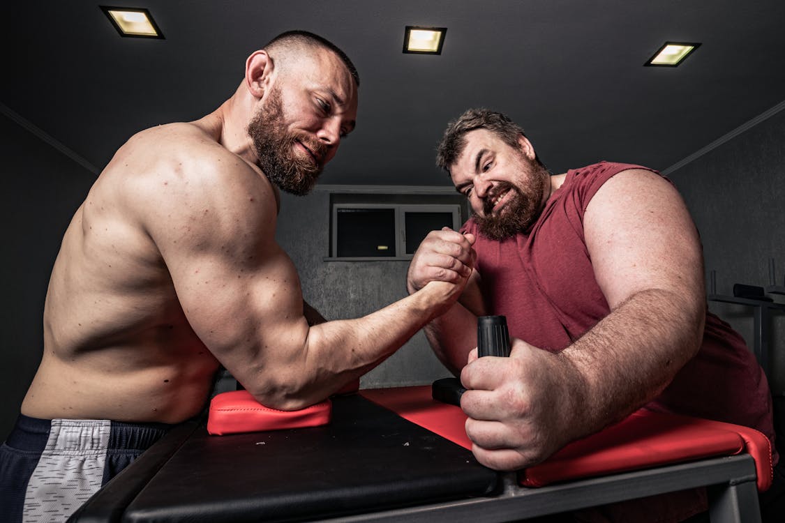 Free Competitive Men Arm Wrestling Stock Photo