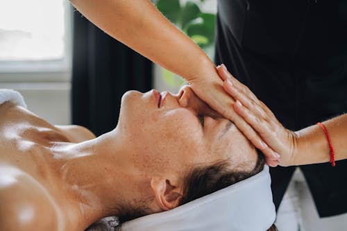 Close-Up Shot of a Woman Having a Face Massage