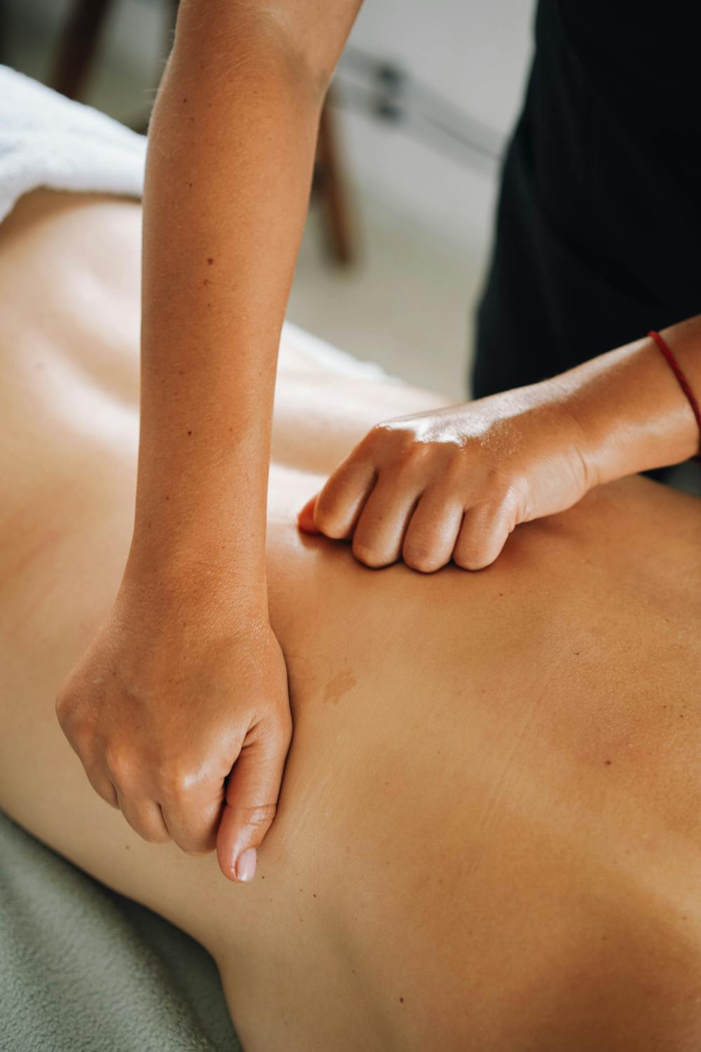 Person getting a deep tissue massage. 