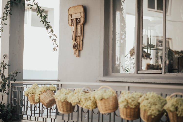 Flowers On Fence Outdoor Of Building