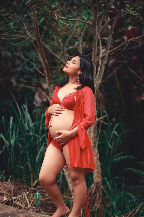 Pregnant Woman in Red Underwear · Free Stock Photo