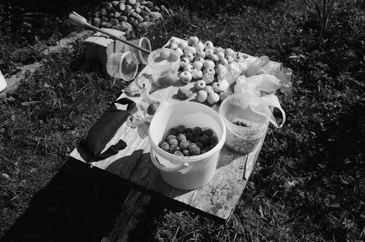 Fruit In Boxes And On Wooden Tray