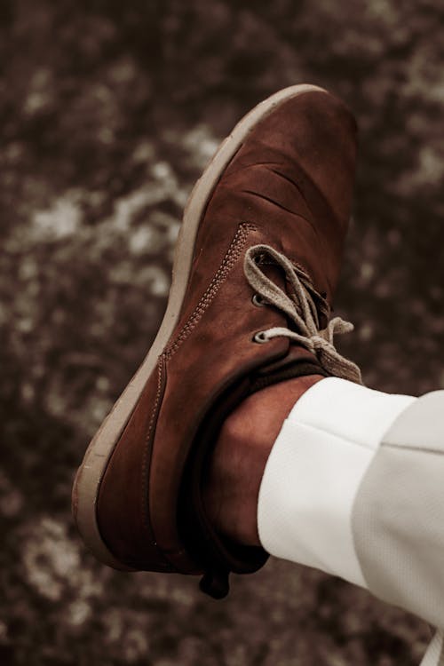 Free Person Wearing Brown Leather Lace Up Shoes Stock Photo