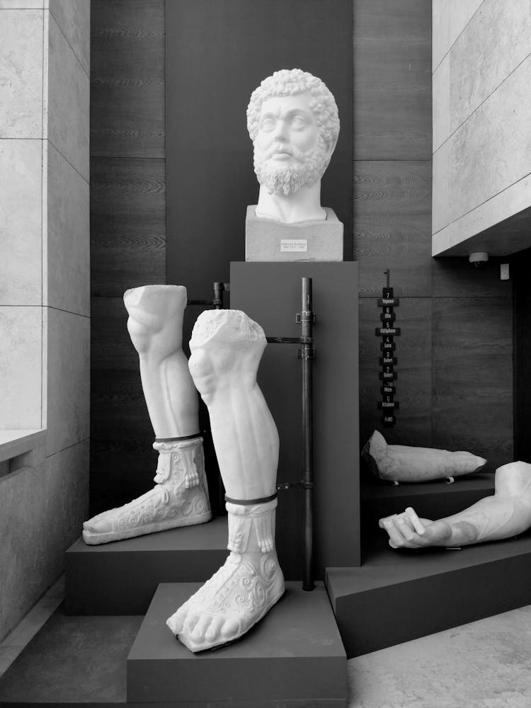 Pieces Of A Sculpture In A Museum