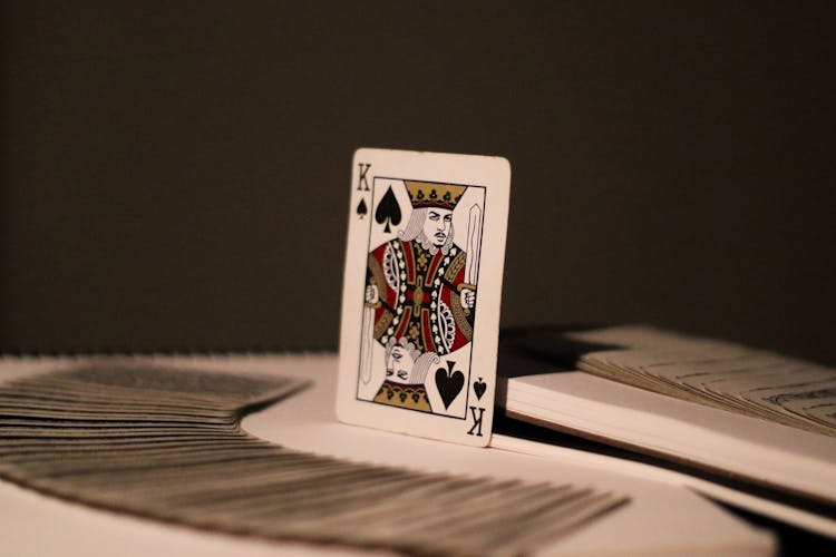 Selective Focus Photo Of A King Of Spade Playing Card